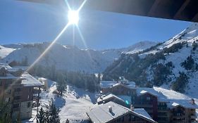 Arc 1950, ambiance chalet luxe 5/7pers dans résidence 5* skis aux pieds avec SPA